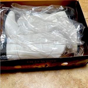 Two pair one used lightly, the other New. Dyable white boots.